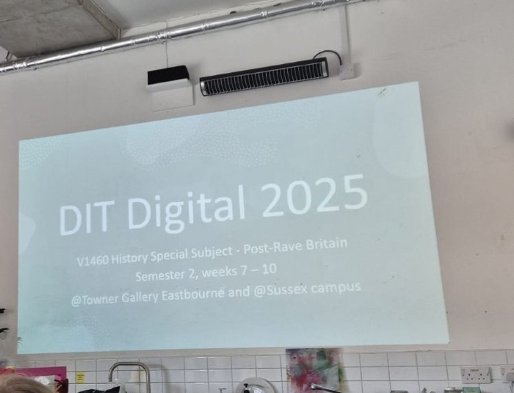 Photograph of a PowerPoint presentation. The slide reads: DIT Digital 2025.